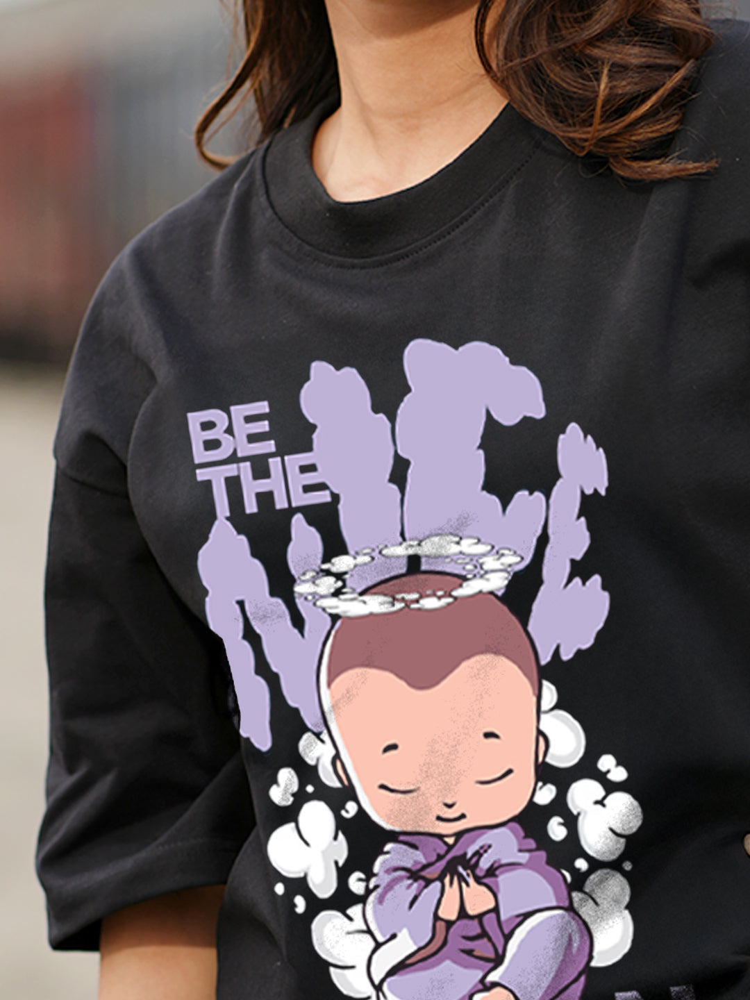 Black sweatshirt with a graphic design 