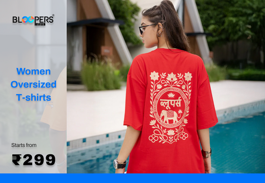 Woman wearing a red oversized t-shirt with promotional text