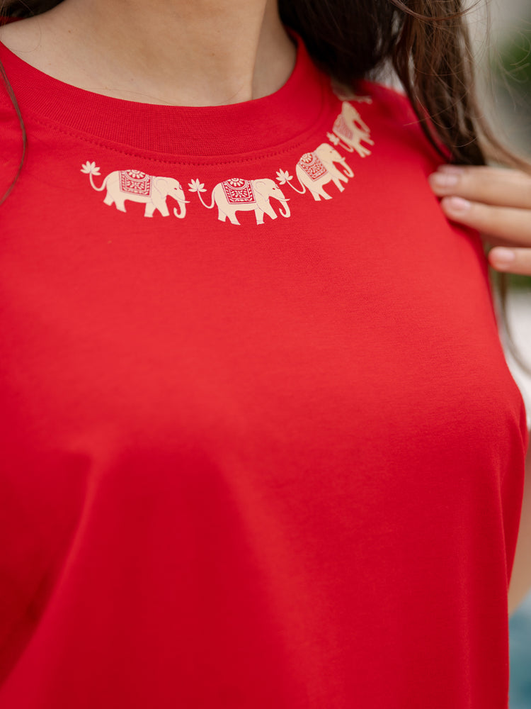 Red t-shirt with white elephant design 