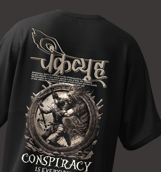 Black t-shirt with graphic design and text on the back