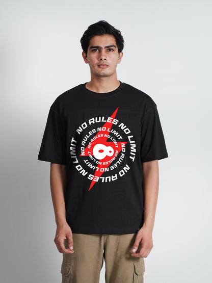 A man wearing a black oversized t-shirt 