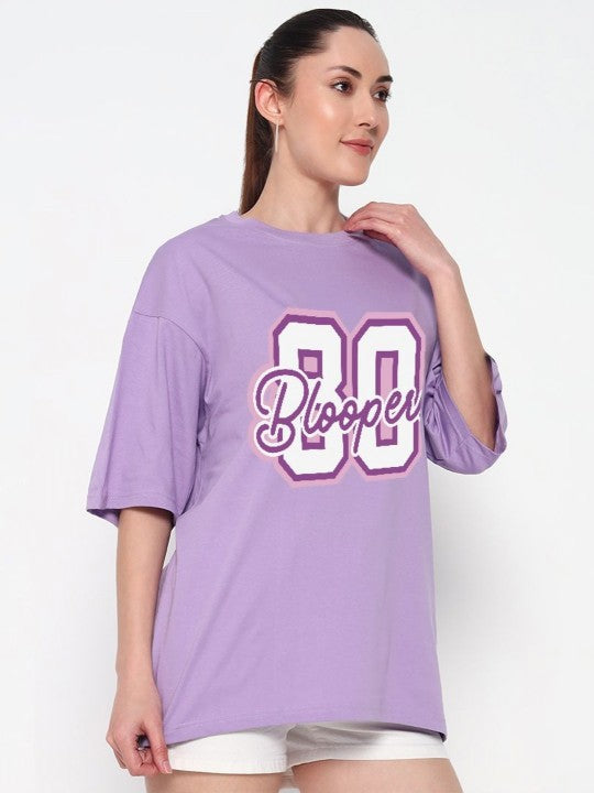 Woman wearing a purple oversized t-shirt with 'Bloopers' text 