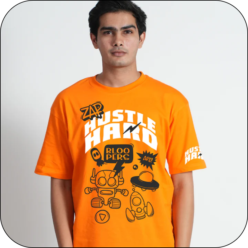 Person wearing an orange t-shirt with graphic designs 