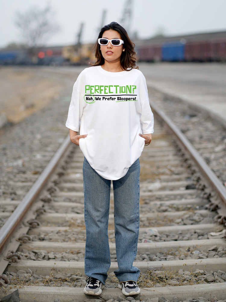 Person wearing a white t-shirt with text on it